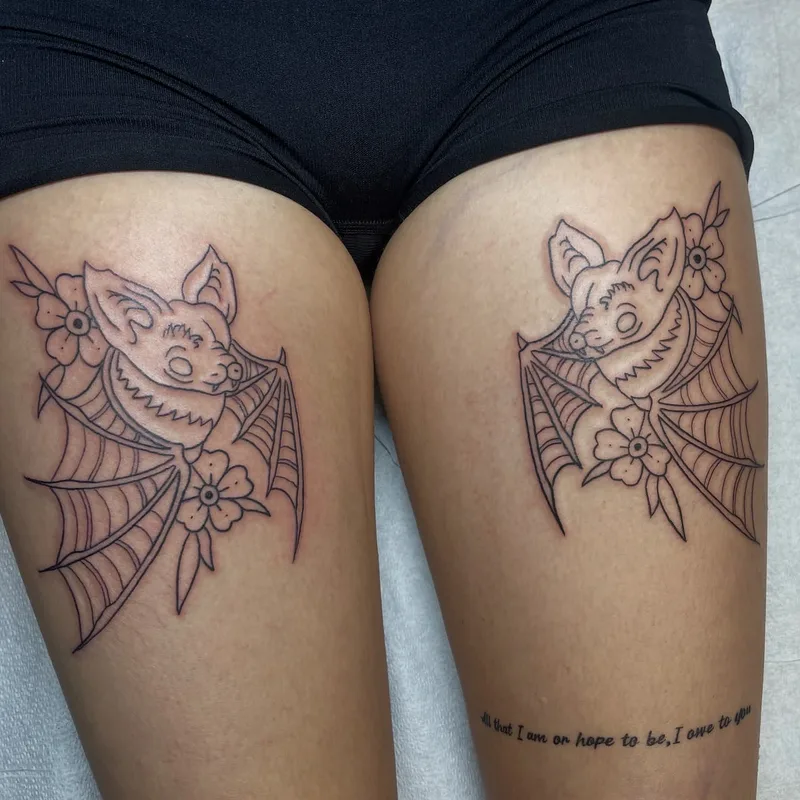 2 matching linework bat tattoos by Jesse