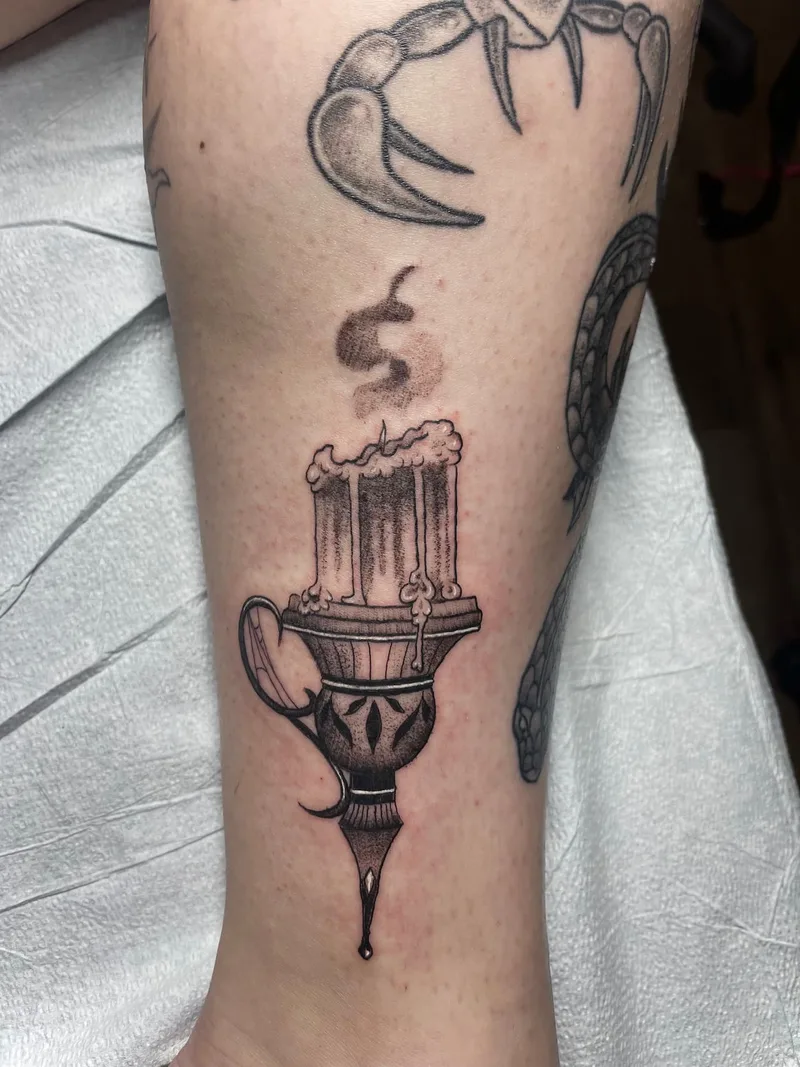 candle stick tattoo by Jesse
