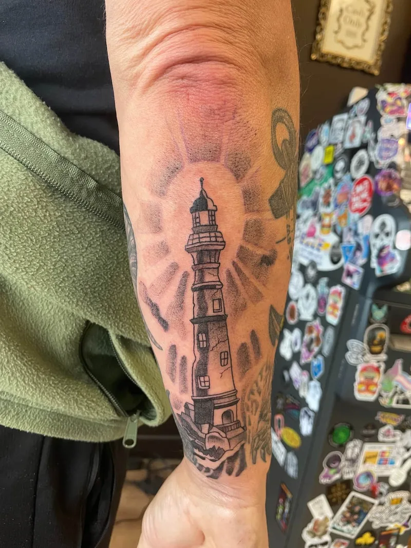 B&G lighthouse tattoo by Jesse